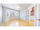 Room with light hardwood flooring, a bay window, and french doors at 2314 Flagstaff Dr, Longmont, CO 80504