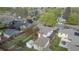 Overhead view captures the property with its detached garage, backyard, and neighborhood at 5115 Bryant St, Denver, CO 80221