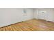 Spacious bedroom with hardwood floors and natural light at 5115 Bryant St, Denver, CO 80221