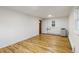 Bright bedroom features hardwood floors, neutral paint, and natural light at 5115 Bryant St, Denver, CO 80221