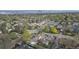 Beautiful neighborhood with tree-lined streets and a distant view of the city skyline at 5115 Bryant St, Denver, CO 80221
