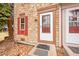 Close up of front entrance showing stone facade and front door at 11901 E Kepner Dr, Aurora, CO 80012