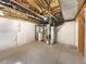 Unfinished basement with exposed beams, and mechanicals at 9486 E 107Th Ave, Commerce City, CO 80640