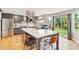 Bright kitchen with stainless steel appliances, light countertops and hardwood floors at 1441 Cherry Pl, Erie, CO 80516
