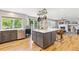 Spacious kitchen island with counter seating, stainless steel appliances, and open layout at 1441 Cherry Pl, Erie, CO 80516