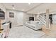 Spacious living room with plush rug, white sofa, providing a cozy and inviting space for relaxation and entertainment at 1441 Cherry Pl, Erie, CO 80516