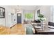 Bright living room and dining space, featuring modern decor and a welcoming atmosphere at 1441 Cherry Pl, Erie, CO 80516