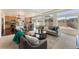 Open floor plan connecting the living room and kitchen creates an ideal space for entertaining guests at 18800 E 55Th Ave, Denver, CO 80249