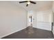 Open bedroom features built in storage and dark hardwood flooring with adjacent access to the rest of the home at 339 Delaware St, Denver, CO 80223