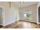 Bright and airy living room with hardwood floors and neutral walls, providing a versatile space at 339 Delaware St, Denver, CO 80223