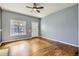 Inviting living room with hardwood floors, natural light, and a ceiling fan for added comfort at 339 Delaware St, Denver, CO 80223