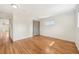 Spacious bedroom with hardwood floors and ample natural light from a window at 3293 S Florence Ct, Denver, CO 80231