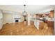 Spacious living room with fireplace, hardwood floors, and natural light perfect for entertaining at 3293 S Florence Ct, Denver, CO 80231