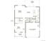 An open-concept first-floor layout that includes a modern kitchen, garage, and flex room at 19120 E 96Th Pl, Commerce City, CO 80022
