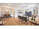 Open-concept living area flows into the kitchen and dining space, creating a welcoming atmosphere at 2380 Jasmine St, Denver, CO 80207