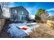 Spacious fenced backyard with a patio, garden area and ample space for outdoor activities and entertaining at 23201 E Orchard Pl, Aurora, CO 80015