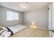 Neutral bedroom featuring carpet, a window with blinds, and ample space for versatility in furniture arrangement at 23201 E Orchard Pl, Aurora, CO 80015
