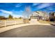 Charming two-story home with an attached garage and a well-maintained yard on a sunny day at 23201 E Orchard Pl, Aurora, CO 80015