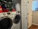 Convenient laundry room with modern Samsung washer and dryer at 23201 E Orchard Pl, Aurora, CO 80015