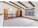 Living room with high ceilings and hardwood floors at 4604 S Raleigh St, Denver, CO 80236