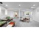 Spacious basement area with ample room for activities and relaxation, neutral tones at 1448 E Maplewood Ct, Centennial, CO 80121