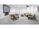Finished basement with projector and screen for entertainment, plus comfortable seating at 1448 E Maplewood Ct, Centennial, CO 80121