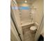 Bright bathroom featuring a white tub with tiled walls and shower, plus a white toilet at 914 Peach Leaf Ln, Elizabeth, CO 80107