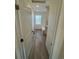 Convenient mud room with built-in bench and wood-look tile flooring at 914 Peach Leaf Ln, Elizabeth, CO 80107