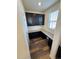 Functional office area with ample counter space, dark cabinets, and great natural light from the window at 914 Peach Leaf Ln, Elizabeth, CO 80107