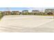A basketball court in a fenced in area ready for recreational activities for all ages at 22472 E Narrowleaf Cir, Aurora, CO 80016