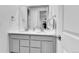 Bright bathroom showcasing a double sink vanity with modern fixtures, offering a luxurious and convenient space at 22472 E Narrowleaf Cir, Aurora, CO 80016