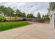 The backyard is very private with a nice grassy area, concrete patio and a stained wood fence at 15828 Greenstone Ln, Parker, CO 80134
