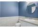 Bathroom featuring a vanity with a sink and a toilet, all in a clean and well-maintained space at 15828 Greenstone Ln, Parker, CO 80134