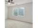 Bedroom featuring a ceiling fan, large window with blinds, and neutral walls at 15828 Greenstone Ln, Parker, CO 80134