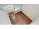 Bright, upstairs living room featuring attractive floors, natural light, and neutral paint at 15828 Greenstone Ln, Parker, CO 80134