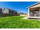 Beautifully manicured backyard with lush lawn and privacy fence, creating a serene outdoor space at 24326 E Ohio Dr, Aurora, CO 80018