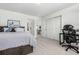 Bedroom featuring neutral walls, carpet, a desk and chair, and a platform bed at 24326 E Ohio Dr, Aurora, CO 80018