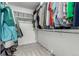 Walk-in closet with ample hanging space, shelving, and carpet at 24326 E Ohio Dr, Aurora, CO 80018