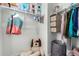 Organized closet featuring a rod, upper shelf, storage cubes and decorative elements that add to its functionality and charm at 24326 E Ohio Dr, Aurora, CO 80018