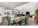 Spacious open-concept layout seamlessly connecting the kitchen, dining, and living areas at 24326 E Ohio Dr, Aurora, CO 80018