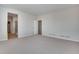 A large bedroom with view of the bathroom at 9982 Wheeling St, Commerce City, CO 80022