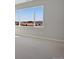 Large bedroom with a view of the outside neighborhood at 9982 Wheeling St, Commerce City, CO 80022