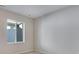 Bright bedroom with a large window letting in natural light at 9982 Wheeling St, Commerce City, CO 80022