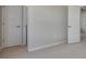 Neutral bedroom with plush carpet and baseboard trim and white doors at 9982 Wheeling St, Commerce City, CO 80022