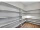 Walk-in pantry with ample shelving offers storage and convenience at 9982 Wheeling St, Commerce City, CO 80022