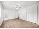 Spacious bedroom with wood-look floors and ample closet space at 1549 S Evanston St, Aurora, CO 80012