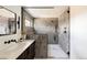 Modern bathroom featuring a walk-in shower with sleek tiling, contemporary fixtures, and a stylish vanity, a spa retreat at 3435 W 17Th Ave, Denver, CO 80204