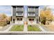 Modern home exterior featuring a symmetrical design, landscaping, and inviting entrance at 3435 W 17Th Ave, Denver, CO 80204