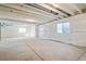 Unfinished basement providing a blank canvas for customization, featuring windows and ample space at 13575 E 110Th Ln, Commerce City, CO 80022