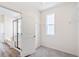 Walk-in closet adjacent to the primary bathroom and showcasing shelves and ample storage space at 13575 E 110Th Ln, Commerce City, CO 80022